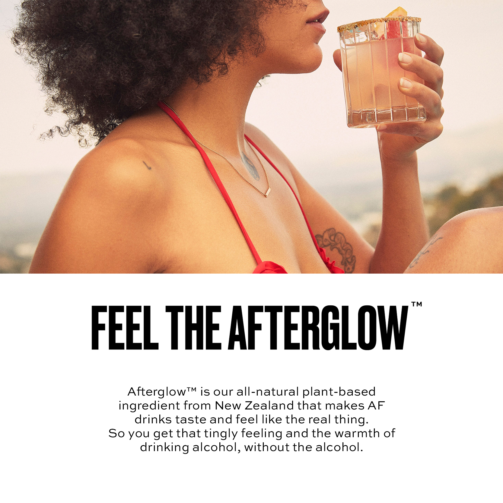 Woman holding a cocktail with 'Feel the Afterglow' text overlay