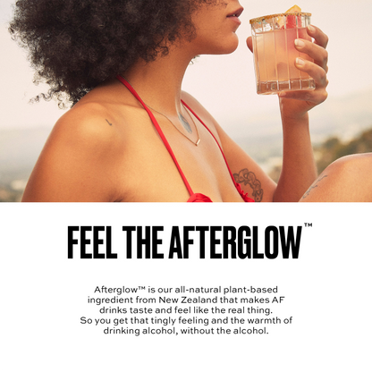 Woman holding a cocktail with 'Feel the Afterglow' text overlay