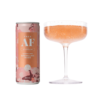 Alcohol-free sparkling rose can and glass with rose design on a white background
