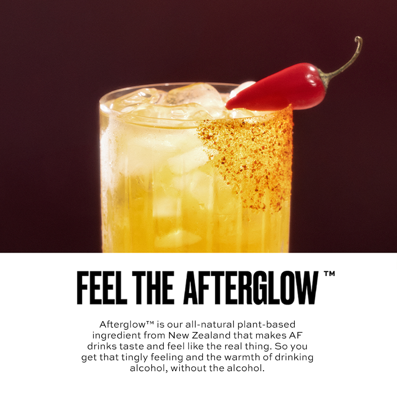 Glass of a spicy drink with a red pepper garnish on a dark background, featuring text about Afterglow.